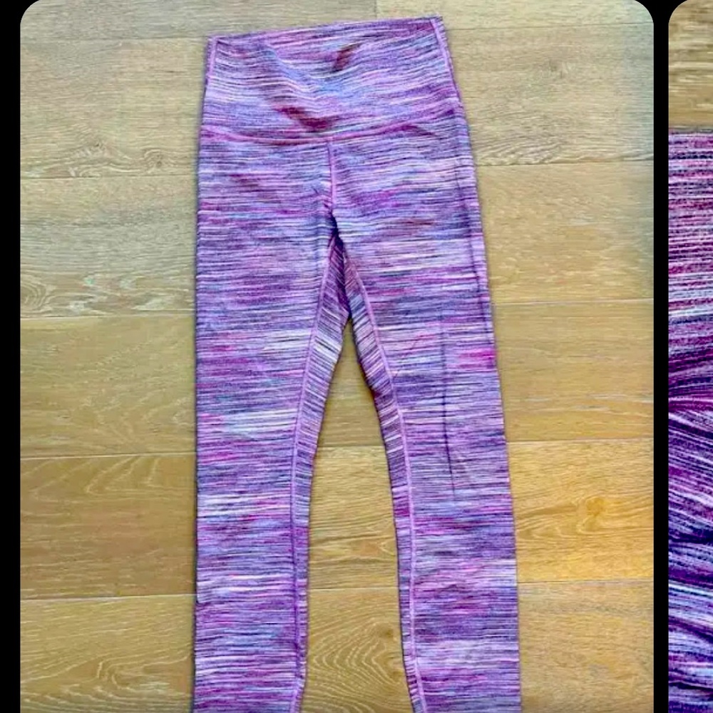 Lululemon pink and grey striped leggings.